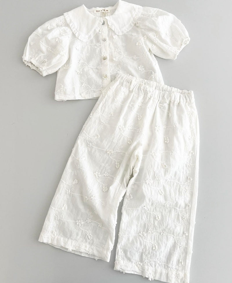 Completo bambina con ricamo all over