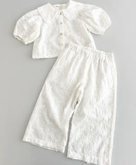 Completo bambina con ricamo all over