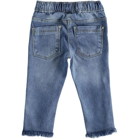Jeans bambina in denim stretch sfrangiati